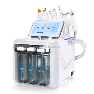 China Exfoliators 7 in 1 hydrafaci oxygen hammer facial machine cold vibration skin scrubber with 7 color led mask for sale