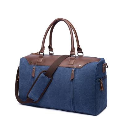 China Vintage Travel Canvas Overnight Bag Duffel Genuine Leather For Men And Women Weekender Tote for sale