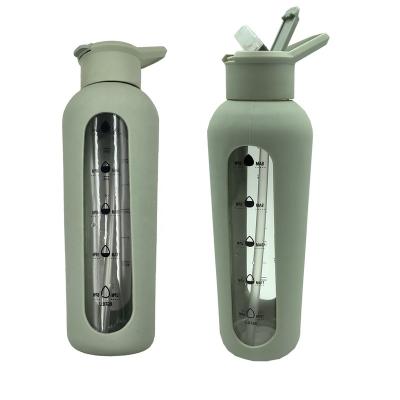 China High Quality Unbreakable Heat Resistant Eco Friendly Stocked Recycled 750ml Glass Water Bottles With Silicone Sleeve And Straw for sale