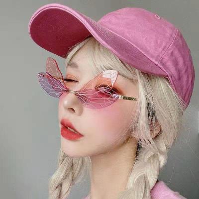 China Fashion Sunglasses Personality Metal Dragonfly Funny Glasses Wings Sunglasses Hip Hop Party Glasses Rimless Logo Custom for sale