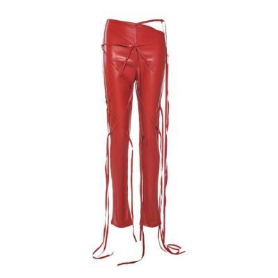 China Waterproof personality waist oblique women plus size pants girls gaiters leather pants for sale