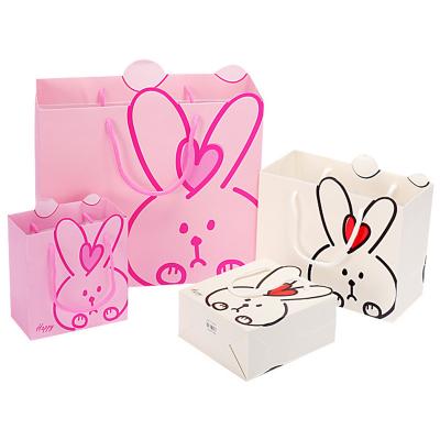 China Reused Full Moon Children's Baby Materials Birthday Gift Bag Portable Bag Cute Rabbit Creative Paper Bag for sale