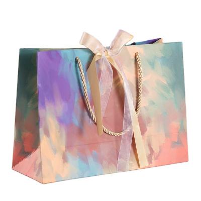 China Recycled Materials Luxury Gift Bag Shopping Bag Custom Paper Packaging Paper Bag For Clothing / Gifts for sale