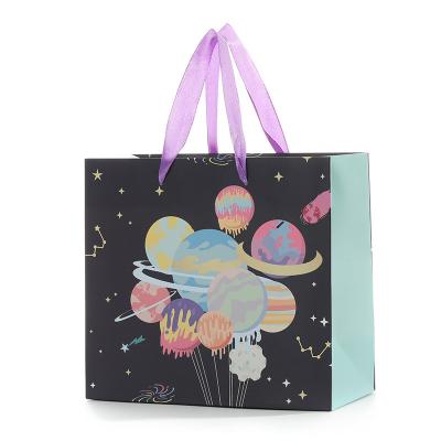 China Wholesale Hot Selling Exquisite Recycled Materials Factory Space Cartoon Pattern Gift Foldable Bag With Ribbon Handle for sale