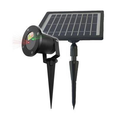 China Residential Solar Outdoor Lighting Landscape Spotlights Red and Blue Laser LED Outdoor Solar Powered Garden Wall Lights for sale