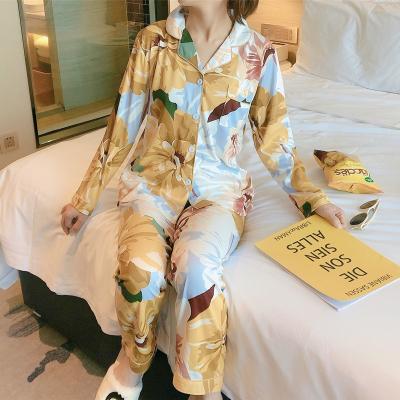 China QUICK DRY Two Piece Sleep To Use Long Sleeves Women Pajamas Floral Print Lapel Cardigan Loungewear Wear Designer Nighty Pajamas Sets for sale