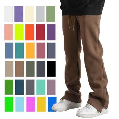 China Custom Anti-Static Embroidery Trotter Pants Drawstring Split Pants Rocket Mens Tracksuits Flare Casual Slim Fit Pants Mens Trousers for sale