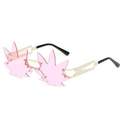 China Direct Selling Rimless Personality Manufacturer Funny Irregular Sunglasses Maple Leaf Shaped Rimless Sunglasses for sale