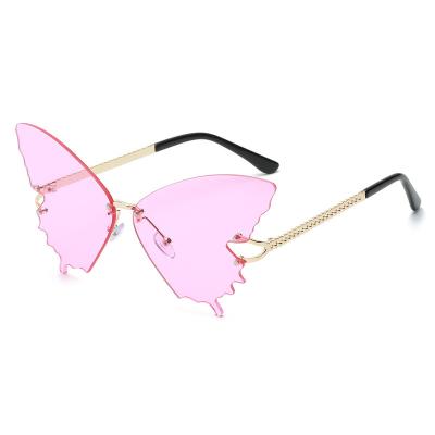 China Manufacturer Wholesale Rimless Women's Sunglasses Customized Butterfly Rimless Sunglasses for sale