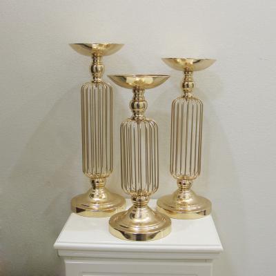 China Durable Wedding Candlestick Gold Three-piece Wedding Props Wedding Decoration Metal Flower Stand Table Centerpiece for sale