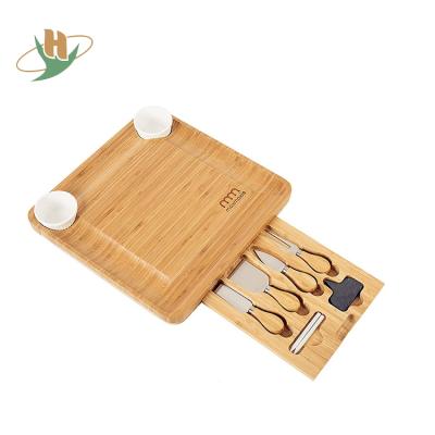 China Sustainable Bamboo Cheese Cutting Board Wholesale With Knife Drawer for sale