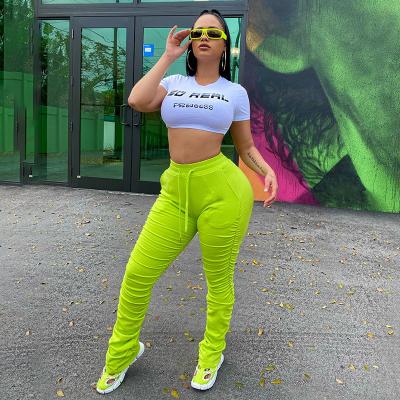 China Anti-wrinkle 2020 wholesale women's summer casual high waist pleated sports tracksuit ruched stacked leggings pants for sale