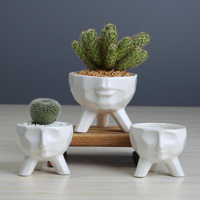 China Amazon face plant cartoon ceramic flower pots white succulent table ornament wholesale hot selling ceramic flower pots for sale