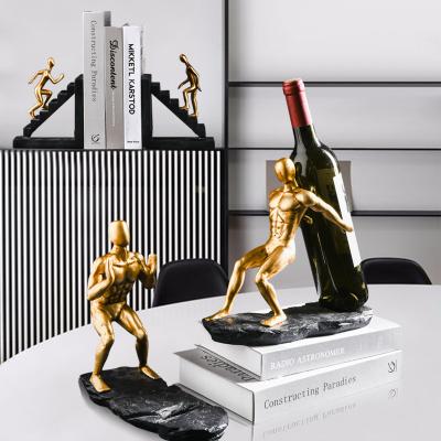 China Europe Customized Wine Creative Home Cabinet Figure Humanoid Decoration Epoxy Resin Golden Statues For Sale for sale