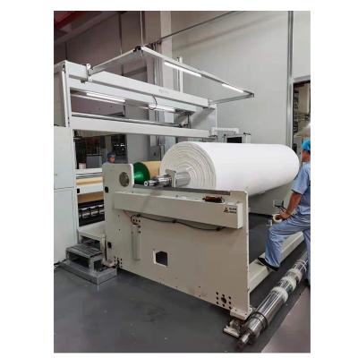 China Nonwoven Fabric And Fabric Rewinder Parent Roll Nonwoven Slitting Machine for sale