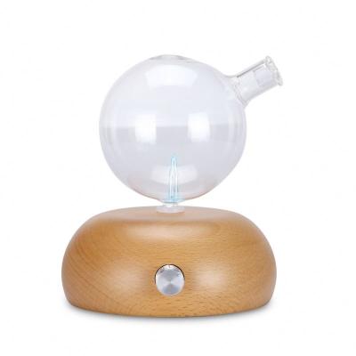 China Feel 2022 Hot Sale Comfortable Nebulizing Diffuser Oil Aromatherapy With 7 Led Light And Solid Wooden Waterless Diffuser For Home for sale