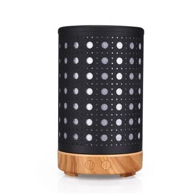 China Comfortable Feel Spot Pattern Iron Art Hollow Style Humidifier Aromatherapy Oil Diffuser for sale