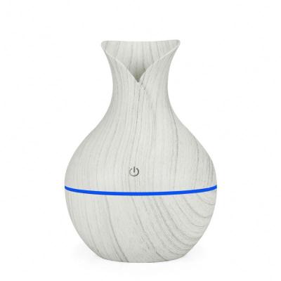 China Smell Portable Comfortable New Design 130ml Oil Aroma Diffuser Lower Prices Wood USB Air Humidifier for sale