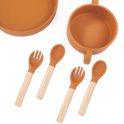 China Sustainable Food Spoon Silicon Bowl Feeding Dish Eating Bib Baby Silicone Forks Wooden Spoon Set for sale