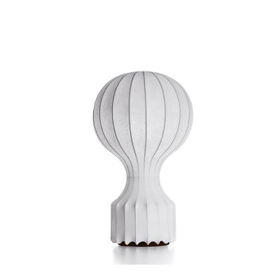 China Modern Unique Design Simple Style Peanut Shape Suitable For Hotel Cafe Metal Table Lamp White Gatto Table Lamp for sale