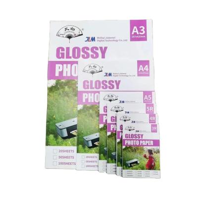 China Vivid Color Performance A4/A3/A5/A6/3R/4R/5R cast coated glossy photo paper for inkjet printer for sale