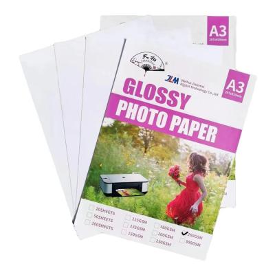 China Instant Dry Excellent A3 260g Inkjet Cast Coated Glossy Photo Paper for sale