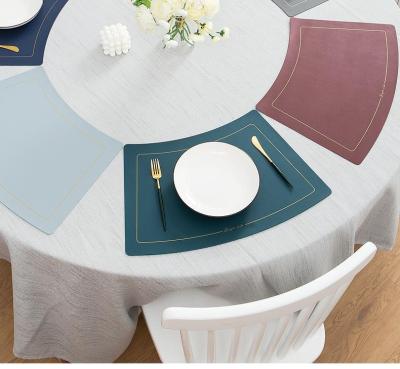 China Viable Factory Wholesale PU Table Mat Waterproof Kitchen Mat Circular Leather Area Place Mat for sale