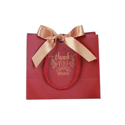 China Recyclable Butterfly Wedding Celebration Candy Bag With Handbag Gift Cosmetics Jewelery Paper Bag Portable Custom Logo for sale