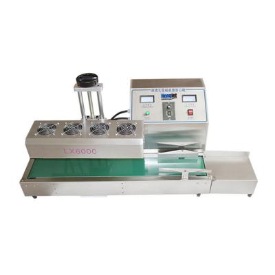 China Automatic Plastic Food Electromagnetic Induction Aluminum Foil Lining Sealing Machine Medicine Bottle Sealer for sale