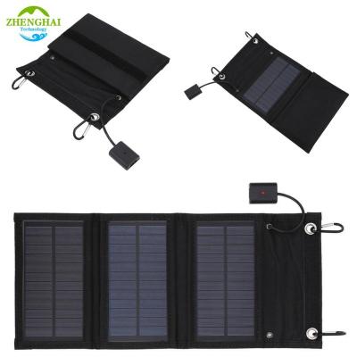 China Solar Power System Wholesale 8W Foldable Solar Panel Bag Battery Charger for mobile phones Portable Folding Solar Panel For Outdoor Camping for sale