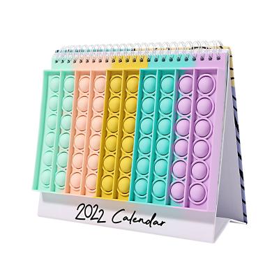 China Table Calendar 2022 Monthly Home Office Calendar with Busy Person Autism Relieve Creative Bubble Toy Cover Design Stand Table Desk Calendar for sale