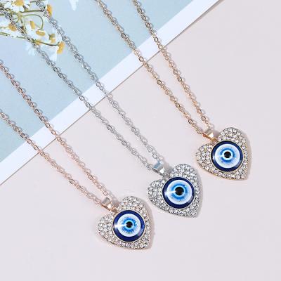 China 2021 Hot Sale Bling Rhinestone Jewelry Vintage Style Eye Shape Environmental Friendly Heart Shape Pendant Necklace for sale