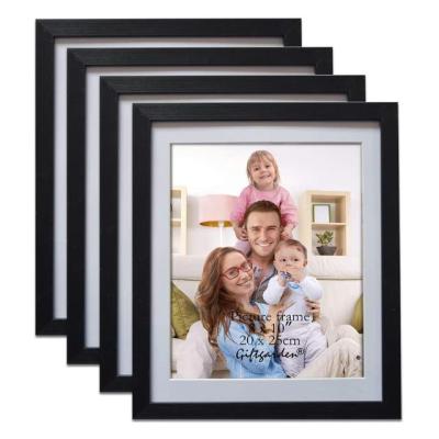 China Custom Photo Wall Four Wooden Picture Frames Living Room Bedroom Office Wooden Photo Frames for sale