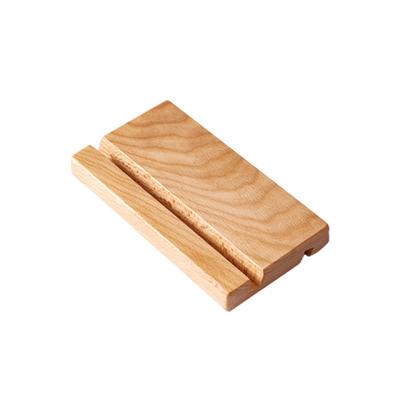 China PORTABLE Lazy Man Support Cell Phone Desk Accessories Base Wooden Cell Phone Bracket for sale