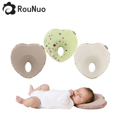 China Memory Cotton Heart Shape Infant Organic Sleeping Head Toddler Memory Syndrome Newborn Foam Flat Head Protector Shaping Baby Pillow for sale