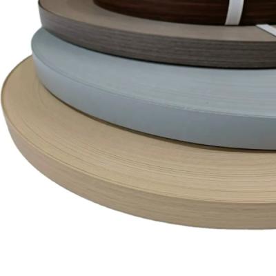 China Melamine PVC Edge Banding Tape , 0.8 Mm Pre Glued Wood Grain Edge Banding for sale