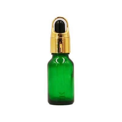 China Hot Sale 10ml 15ml 20ml Green Personal Care Essential Oil Dropper Bottle With Gold With Silver Flower Basket Dropper Cap for sale