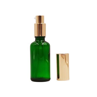 China Personal Care 50ml Green Glass Spray Bottles With Spray Top for sale