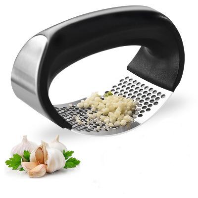 China Hot Sales Multifunctional Stainless Steel Garlic Press Garlic Press Multifunctional Manual Stainless Steel With Plastic Handle For Cooking for sale