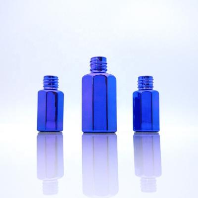 China Cheap price green color perfume essence oud oil glass red blue paint bottle refillable for sale