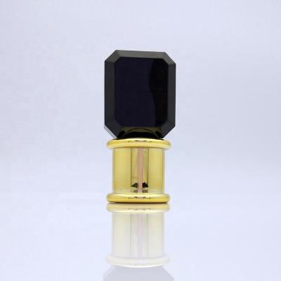 China Non Spill 2021 High Quality Round Shape Black Gold Square Base Plastic Caps For Perfume Bottles for sale