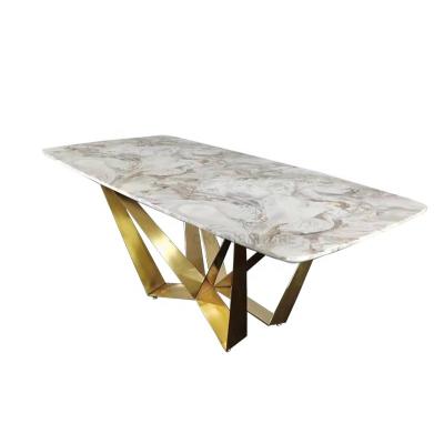 China (Other)dining room gold stainless steel adjustable unique fancy modern luxury metal crossed leg stone dining table 8 seater marble for sale