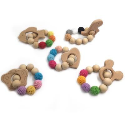 China Wholesales Non-Toxic Beech Wooden Baby Teether DIY Chewing Beads Nurturing Bracelet Teether Rattle Toys for sale