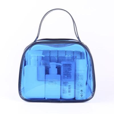 China Customized Clear Tote Bag With Shoulder Cosmetic Straps And Zippered Top Custom Transparent Blue Toiletry Bag for sale