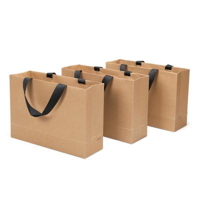 China Recycled Materials Custom Print Shopping Gift Boutique Packaging Paper Bag Black White Brown Takeaway Kraft Paper Bag With Logo For Fast Food for sale