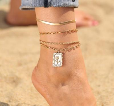 China Vintage Fashion Multilayer Snake Bone Chain Rose Anklet New Alloy Beach Anklet Set 4 Piece Set for sale