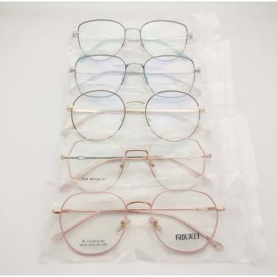 China Match Random Fashionable Men's Titanium Alloy Retro Metal Clearance Stock Optical Glasses Irregular Optical Frame B for sale