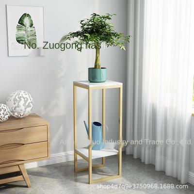 China Nordic Modern Iron Flower Stand Floor Gold Simple Indoor Rack Radish Green Shelf Decoration Soft Bonsai Living Room Decoration for sale