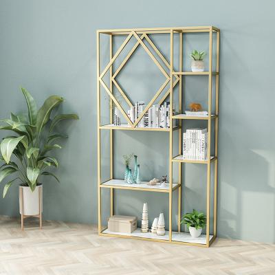 China Modern Solid Wood Creative Nordic Lightweight Luxury Simple Desk Floor Shelf Wrought Iron Living Room Decoration Partition Storage Rack for sale