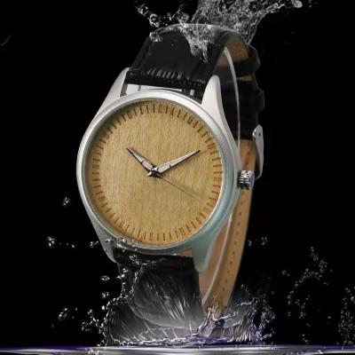 China Simple But Elegant Design Sand Blust Alloy Quartz Watch Case Wood Dial Leather Strap Fashion Unisex Watch OEM Watch for sale